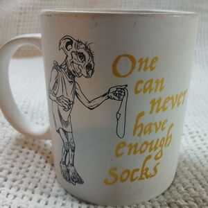 Charming White Mug with Quirky Yellow and Black Design